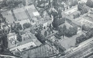 An aerial photograph showing the extensive grounds of The Old Manor Hospital (formally Fisherton House Asylum). The main block incorporating Finch House is in the middle of the image.